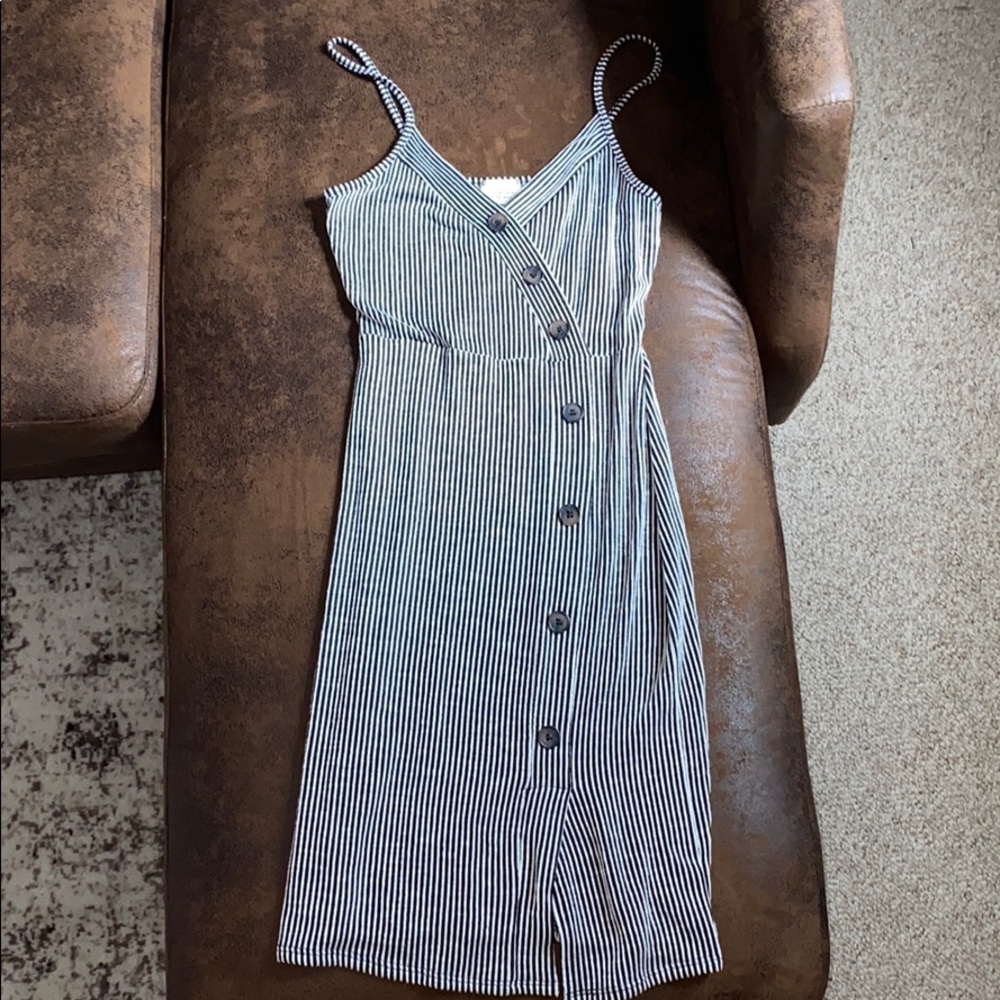 Caution To The Wind midi dress with small slit.